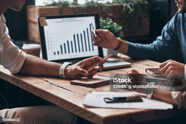 Checking The Numbers Stock Photo - Download Image Now - Analyzing, Business, Data