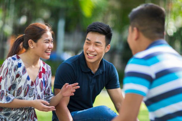 Friends chatting in the park