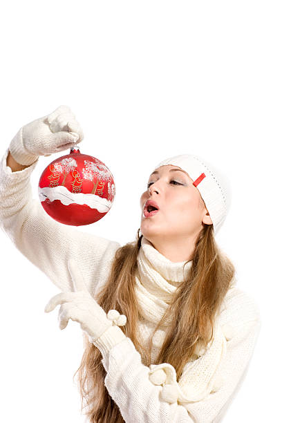 Smiling woman in sweater over christmas tree background