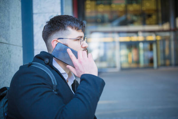 istock Handsome bearded businessman commuting to work 935410456