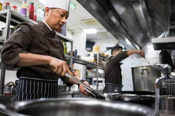 istock Cooking in Chinese restaurant 935411926