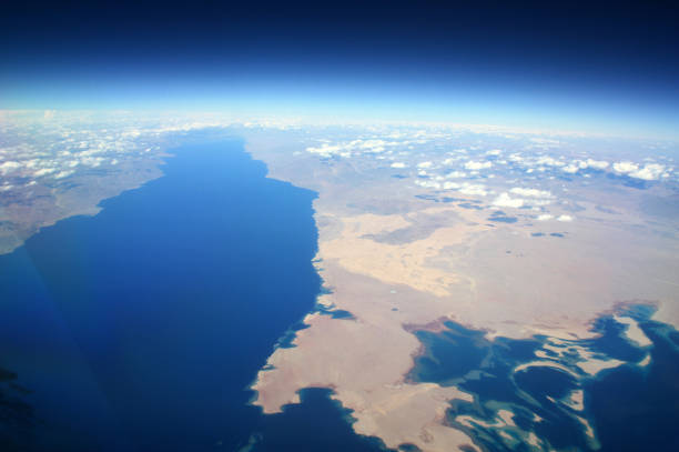 Picture taken inflight overhead the Red Sea. The Sinai Peninsula is on the left, Saudi Arabia on the right.