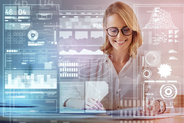 istock Positive young woman smiling while having a productive working day 935413958