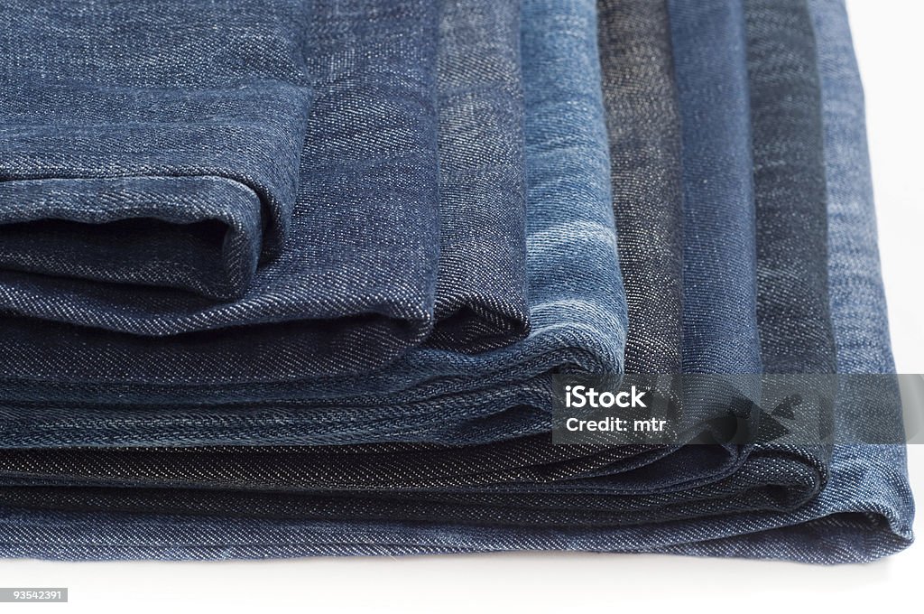 Doblado nuevo Blue Jeans - Foto de stock de Apilar libre de derechos