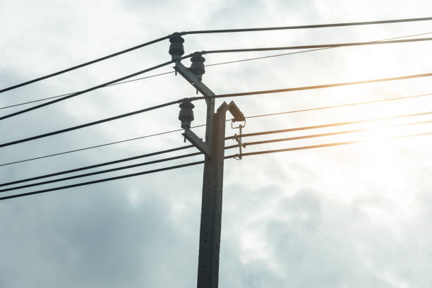 istock Electricity concept. Close up high voltage power lines station. 935425018
