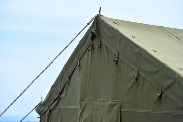 Exterior of a green military tent stock photo