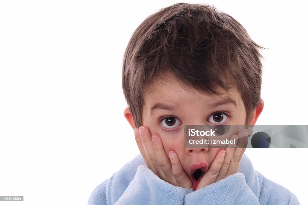 Petit garçon dans des chocs, regardant à la caméra - Photo de Choc libre de droits