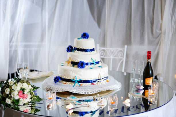 istock wedding cake, bouquet, stemware and champagne 935429020