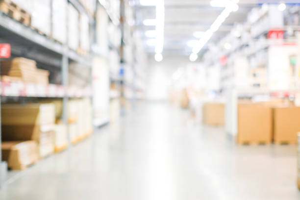 istock Blurred business background, Blur warehouse with bokeh light background 935437350