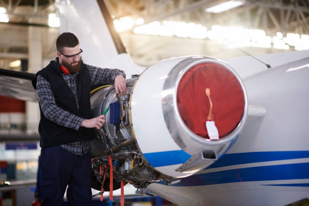 istock Aircraft mechanic in the hangar 935469952