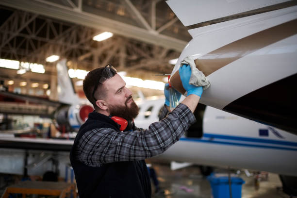 istock Aircraft mechanic in the hangar 935470808