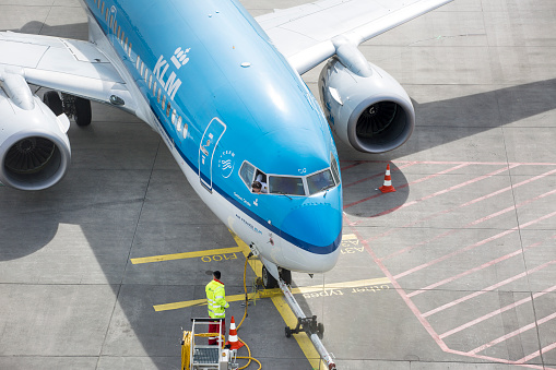 Apron of Frankfurt International Airport, a Boeing of Dutch airline KLM is being refuelled. Frankfurt am Main Airport is a large international airport located in Germany, 12 km off the city centre of Frankfurt. It is the largest airport in Germany and serves nearly all international destinations in the world.