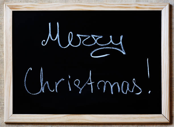 istock Merry Christmas written on a blackboard 935472182