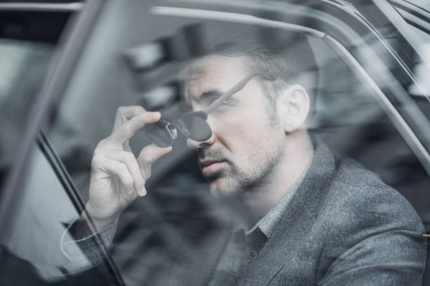 istock Mature man puts his sunglasses on 935472382