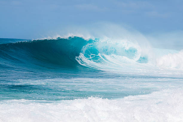 istock Blue and white breaking waves in the sea 93547411