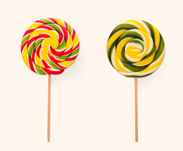 istock Spiral lollipops on white background. Colorful candies, isolated 935476080