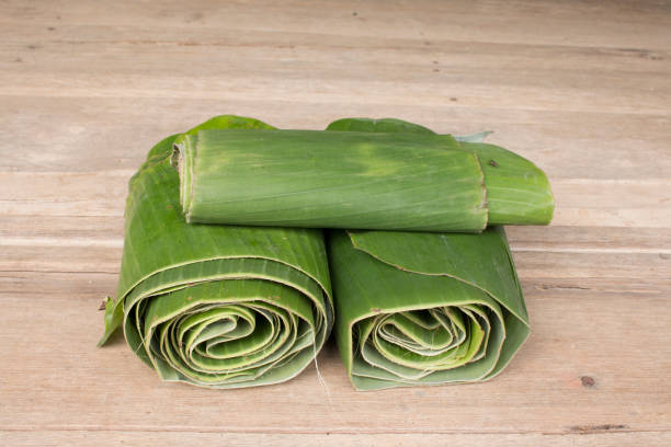 istock Green fresh banana leaf for nature package. 935479976