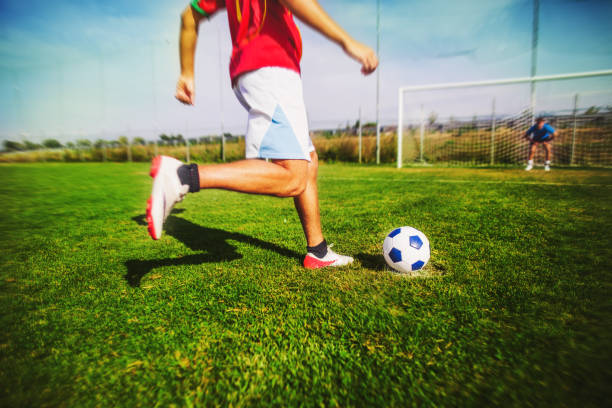 istock Soccer player kicking a penalty 935480430