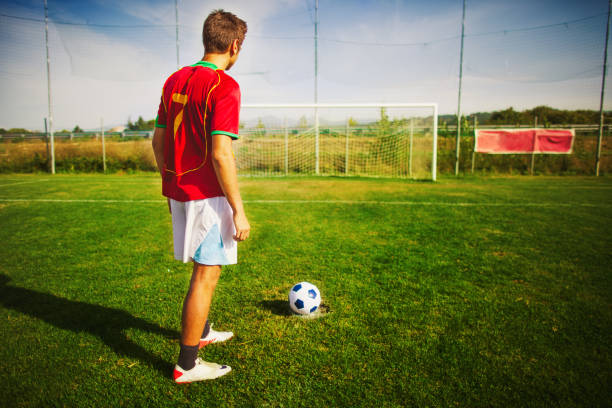 istock Soccer player kicking a penalty 935480432