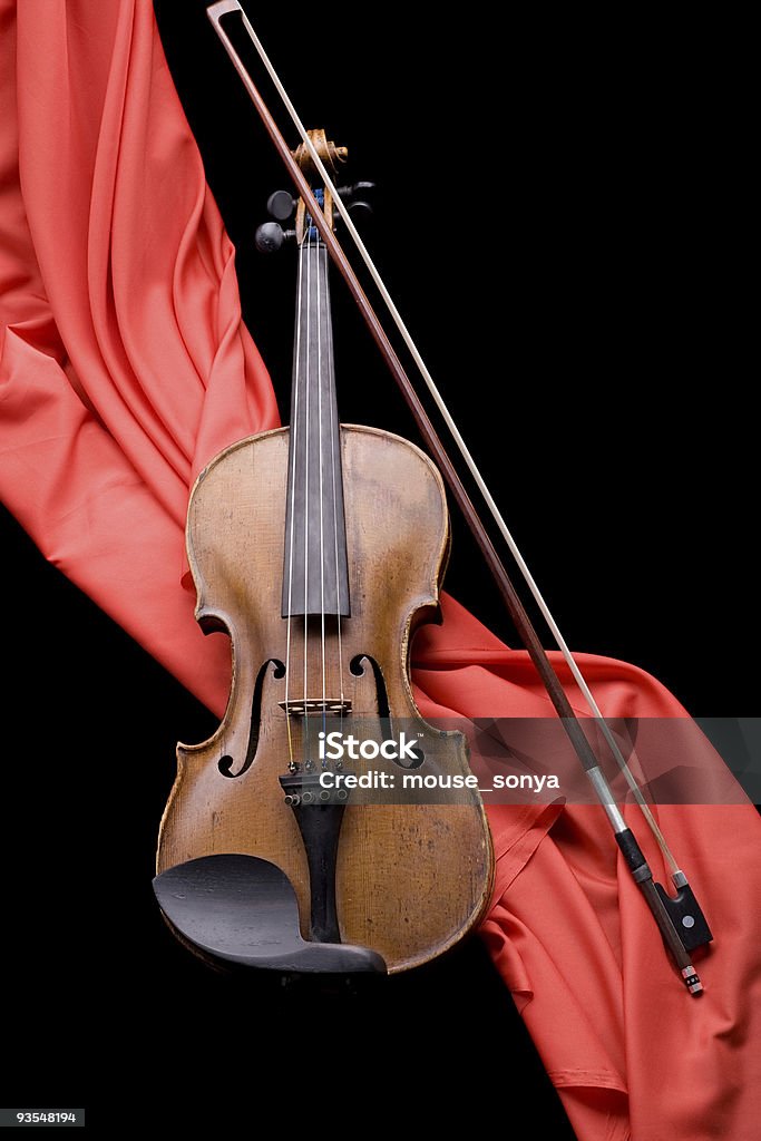 violin on scarlet silk  Art Stock Photo