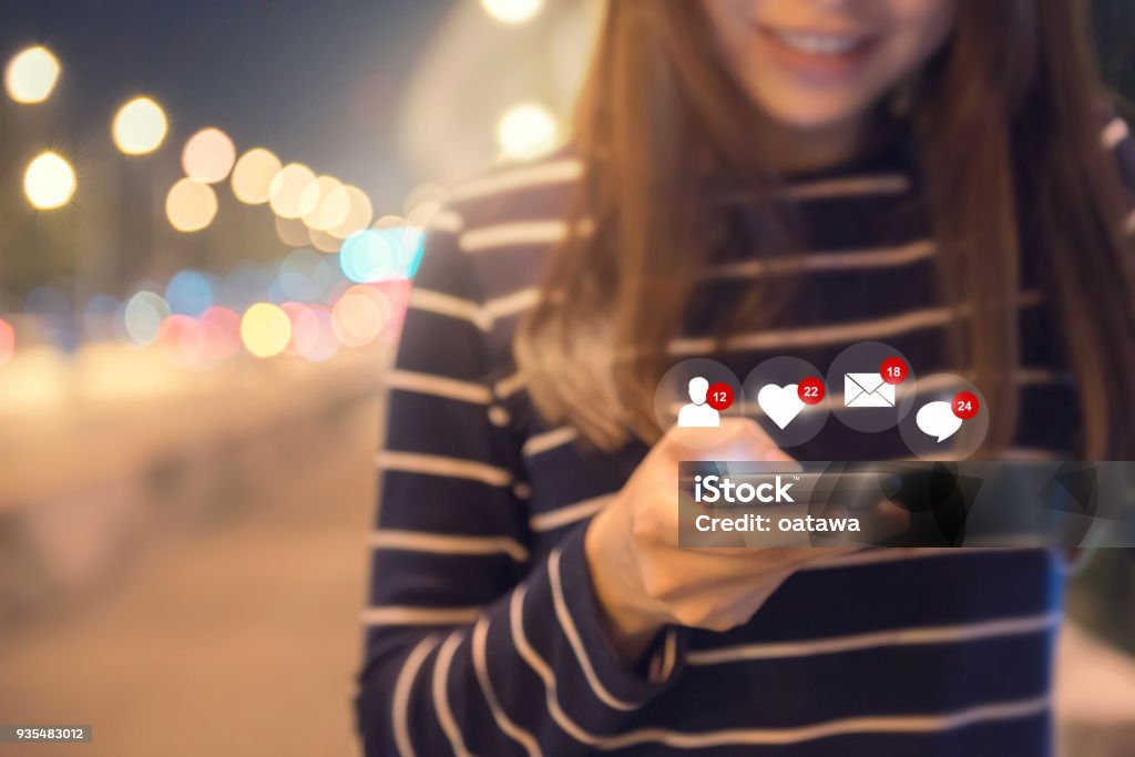 Happy woman hands using mobile smartphone with icon social media and social network. Happy woman hands using mobile smartphone with icon social media and social network. copy space. Social Media Stock Photo