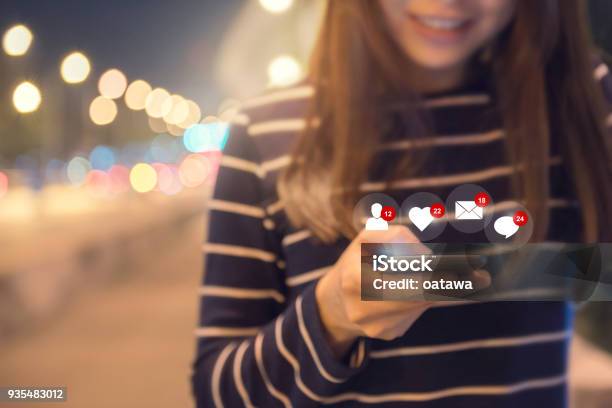 Happy Woman Hands Using Mobile Smartphone With Icon Social Media And Social Network Stock Photo - Download Image Now