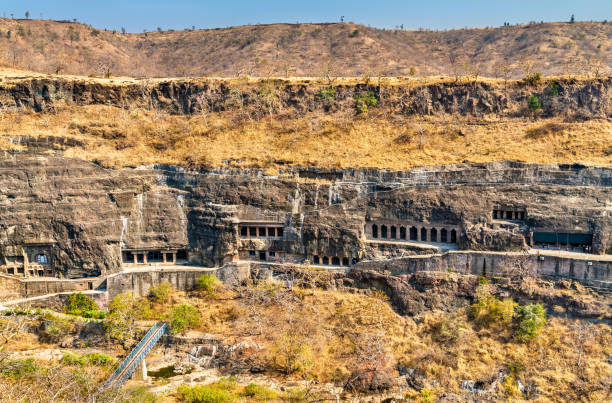 Panorama of the Ajanta Caves. UNESCO world heritage site in Maharashtra, India Panoramic view of the Ajanta Caves. A UNESCO world heritage site in Maharashtra, India ajanta caves photos stock pictures, royalty-free photos & images