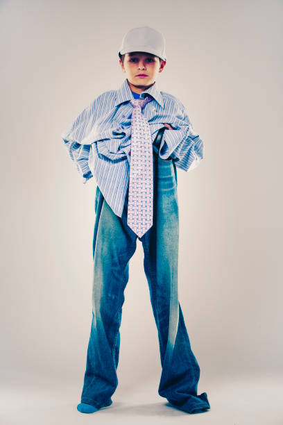 istock funny boy wearing Dad's clothes 935489152