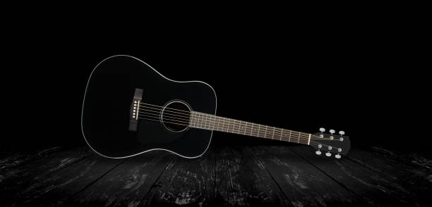 istock Musical instrument - Black acoustic guitar black background 935489384