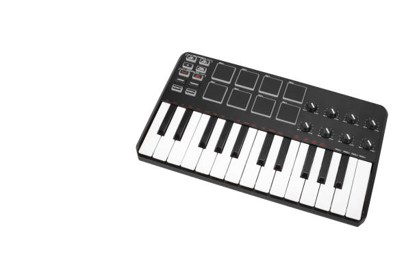 istock Musical instrument - MIDI keyboard white background 935492218