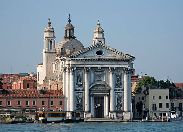 From the shore of Riva degli Schiavoni, near St. Mark's Square, the sunset is an incredible sight. In winter, the sun sets exactly behind the domes of the Basilica of Santa Maria della Salute. Its glow illuminates the western sky above the end of the Grand Canal.