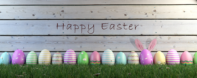 Colorful Easter eggs on grass with the white wooden background. ( 3d render )