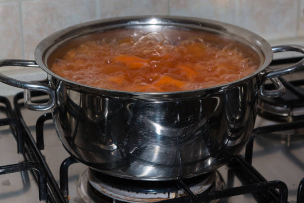istock Metallic Pot with Italian Style Tomato Sauce. 935506746