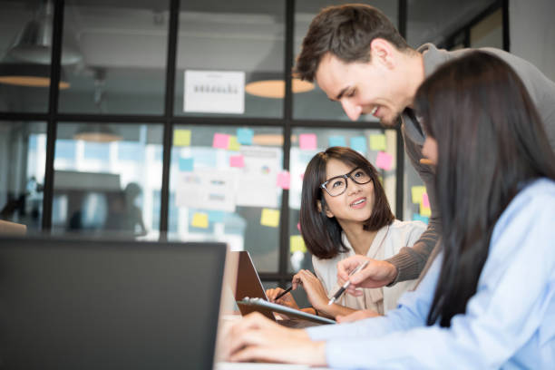 istock Business people are discussing about their work. 935506974