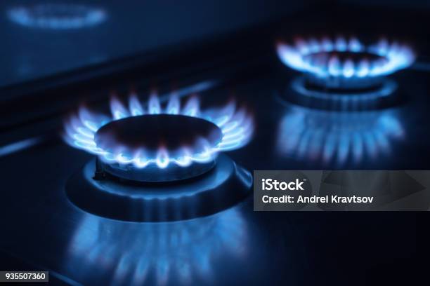 Two Gas Burners In The Dark In The Kitchen Stock Photo - Download Image Now - Gas, Cooking, Stove