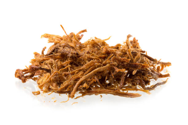 istock Dried shredded pork isolated on a white background 935511726
