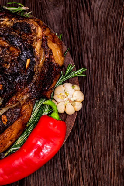 istock Tasty beef steak with spices and vegetables close 935523728
