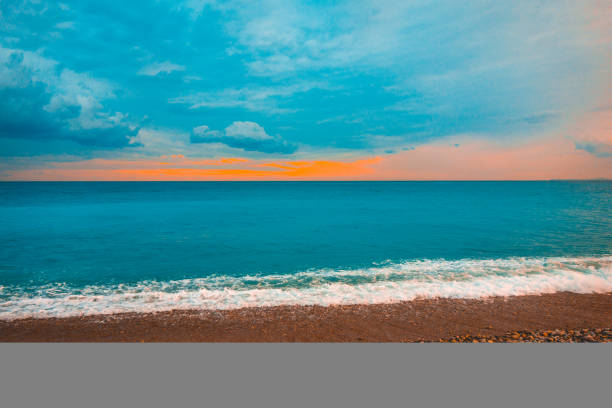 istock high contrasted stone beach in the afternoon 935531544