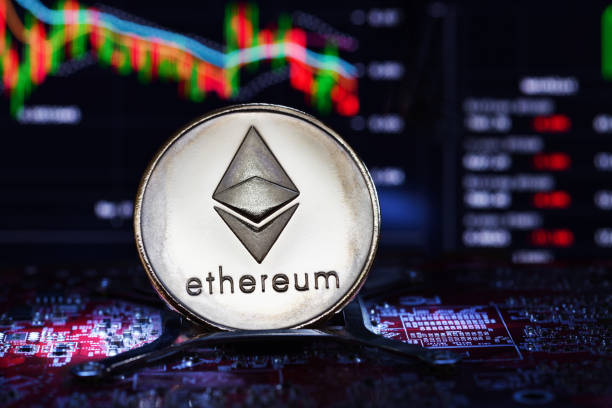 Ethereum. Crypto currency Moscow, Russia - March 18, 2018: Ethereum. Crypto currency. Ethereum golden coin on a chart on background. Blockchain technology ethereum stock pictures, royalty-free photos & images