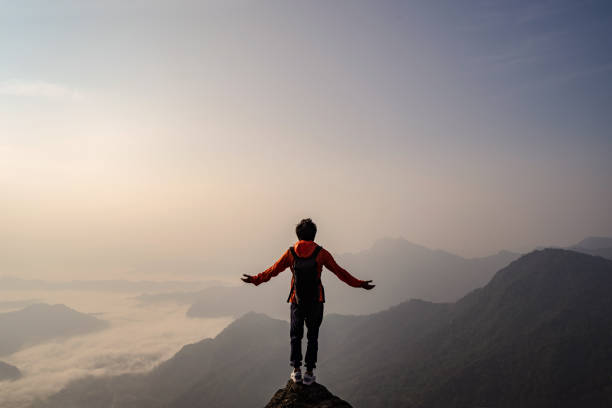 istock Young traveler standing and looking at beautiful landscape 935534480