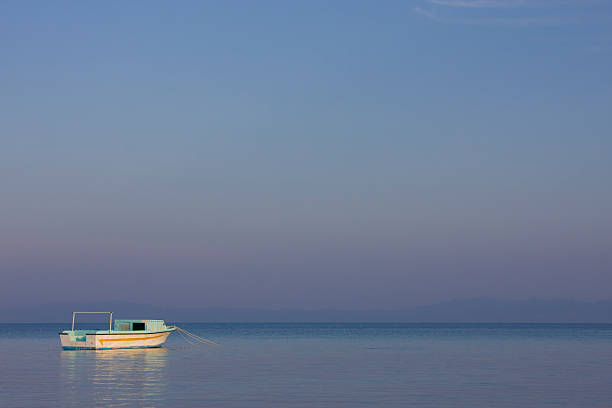 istock Background. A boat on water against mountains #2 93553493