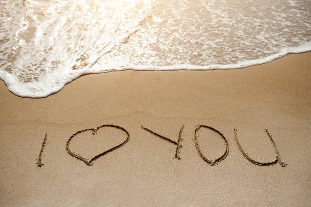 istock I love you - message on the sand beach - love concept 935541676
