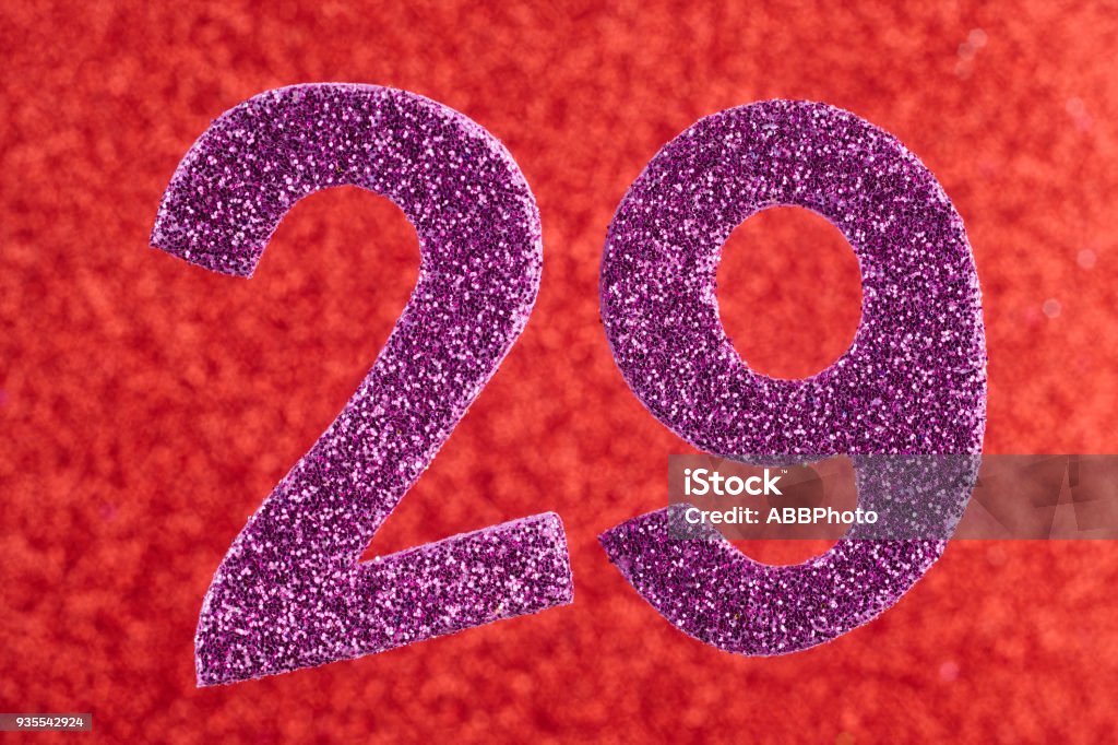 Number Twentynine Purple Color Over A Red Background Anniversary Stock