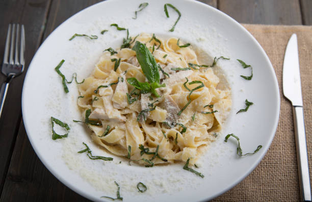 istock Fettuccine Alfredo close up 935545454