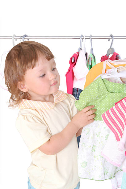 istock child in the clothes shop 93557407