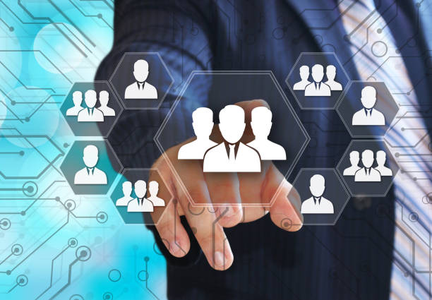 istock The businessman chooses user to network Interface online button on the touch screen with a futuristic background .The concept user to network Interface online 935578224