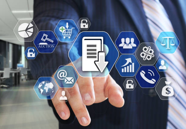 istock The businessman chooses Document management system, DSM on the virtual screen in social network connection. 935580364