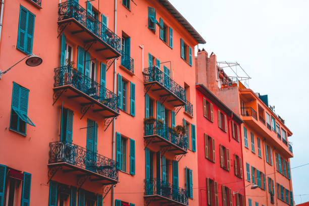 istock red facaded apartments with darken balcony 935591312
