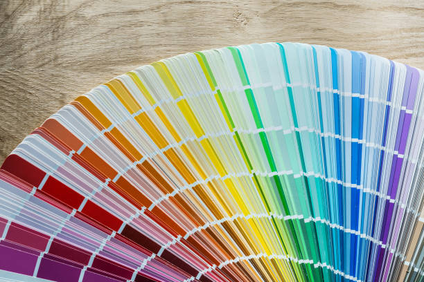 istock Color pantone fan on wooden meter 935605948
