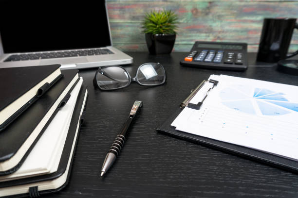 istock Office desk table with supplies 935612678